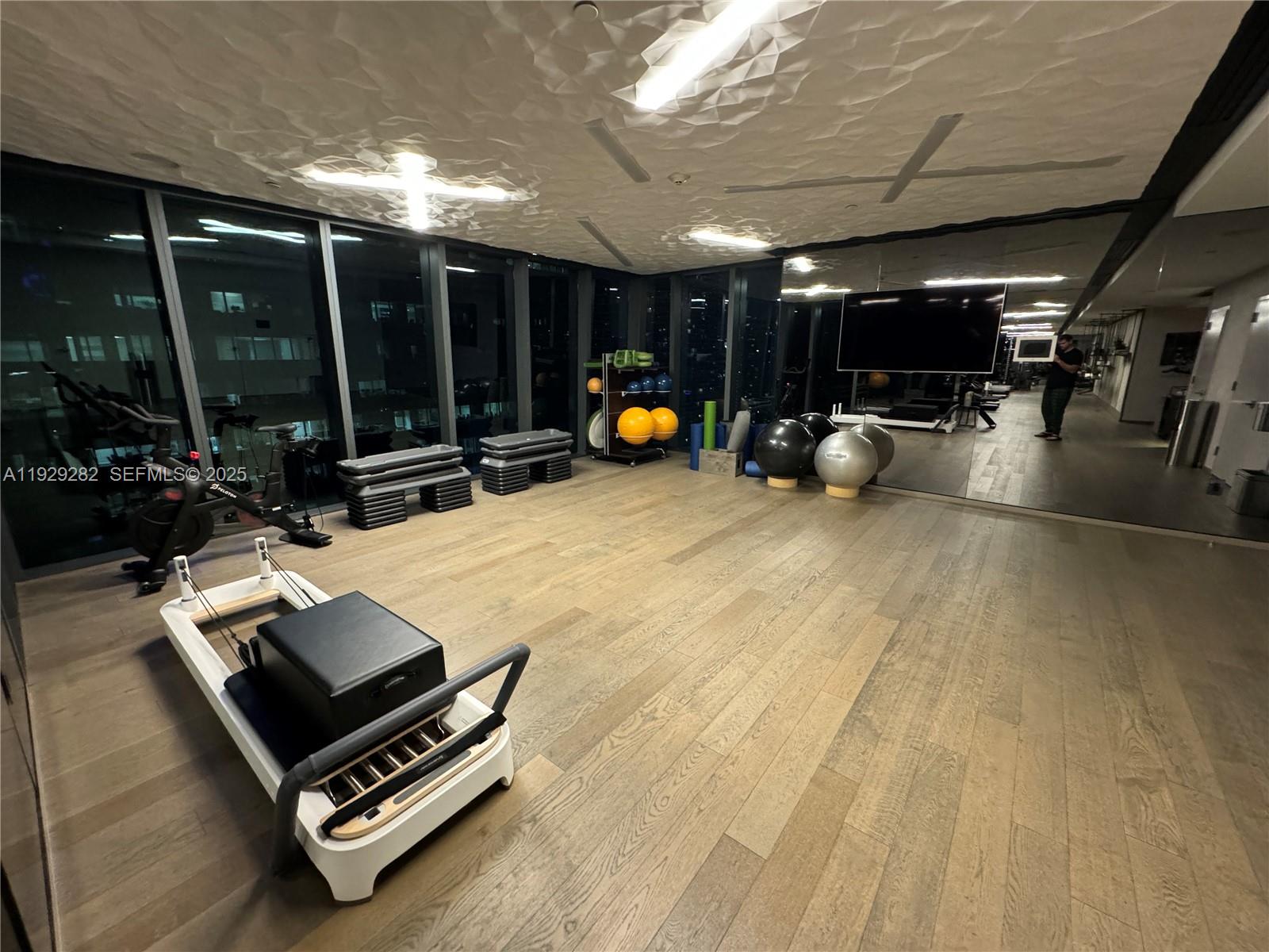 1451 Brickell Avenue, Unit 1105 Miami, FL 33131 - Photo 26 of 43 a outdoor space with lots of table and chairs