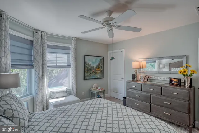 an aerial view of a house with a big yard