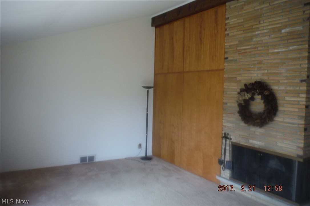 525 Overwood Road Akron, OH 44313 - Photo 3 of 19 This beautiful two story Fireplace highlights the living room.