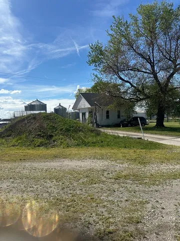 a view of a town with large trees