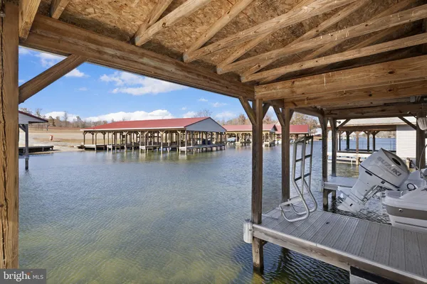 a view of a balcony with wooden floor