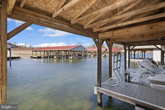 a view of a balcony with wooden floor