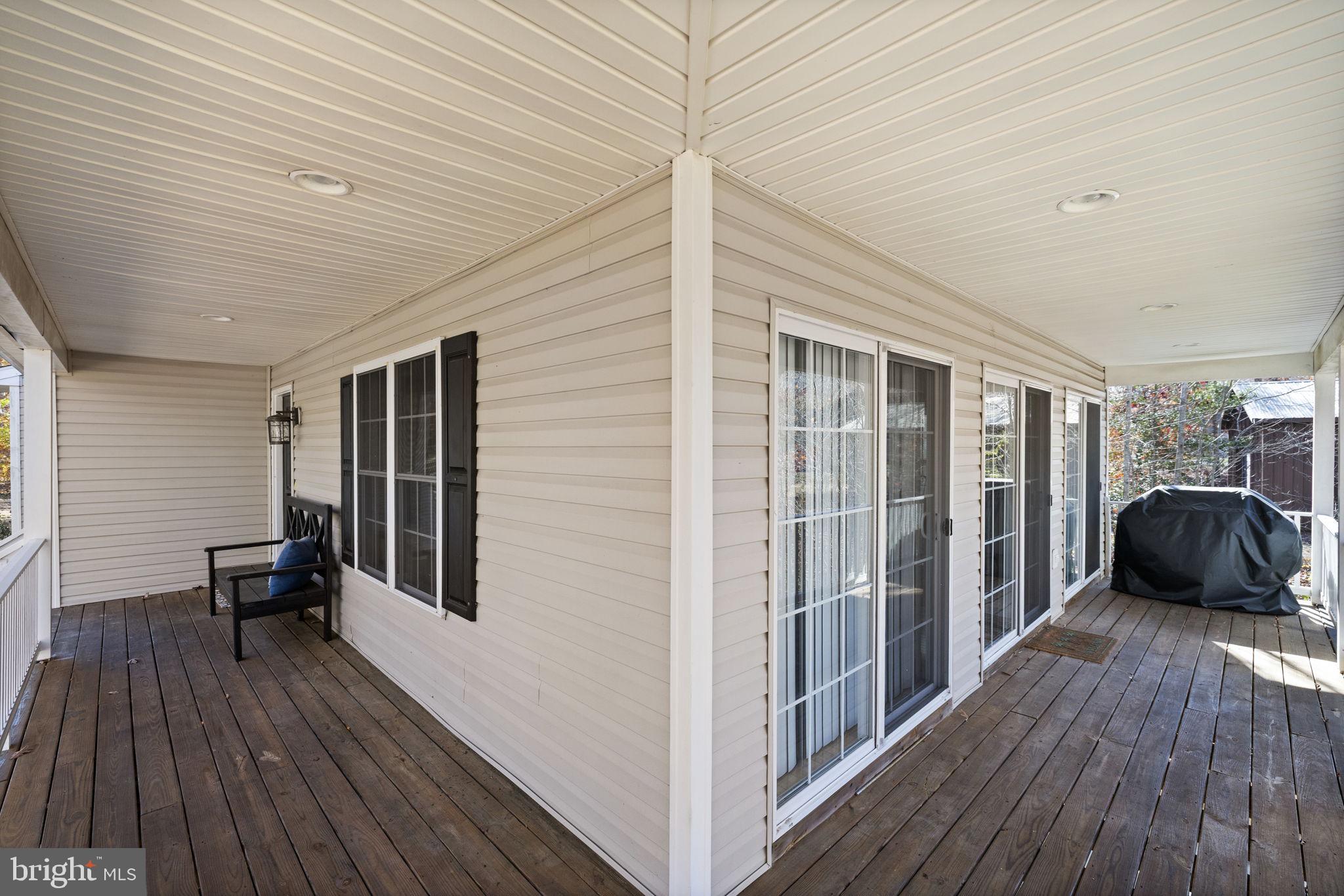 14 Oak Road Bumpass, VA 23024 - Photo 18 of 75 a view of a patio with wooden floor and roof