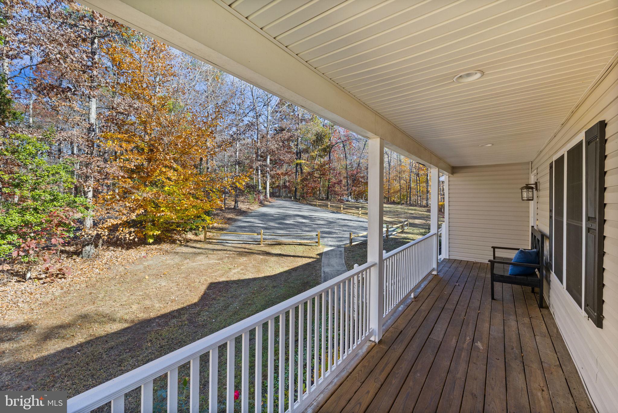 14 Oak Road Bumpass, VA 23024 - Photo 20 of 75 a view of a balcony with wooden floor