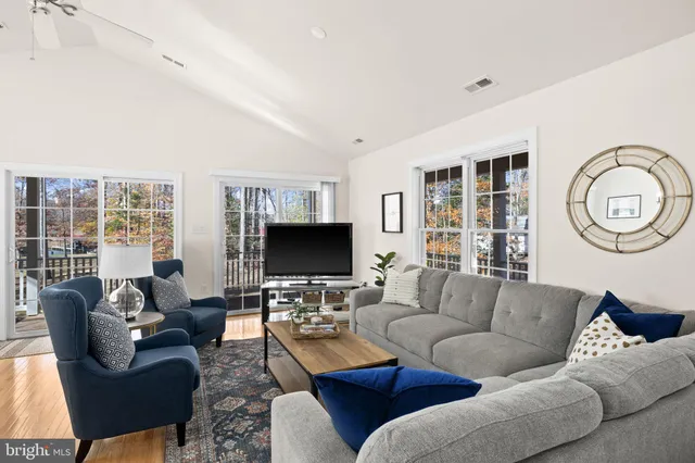 a kitchen with stainless steel appliances granite countertop a refrigerator sink and cabinets