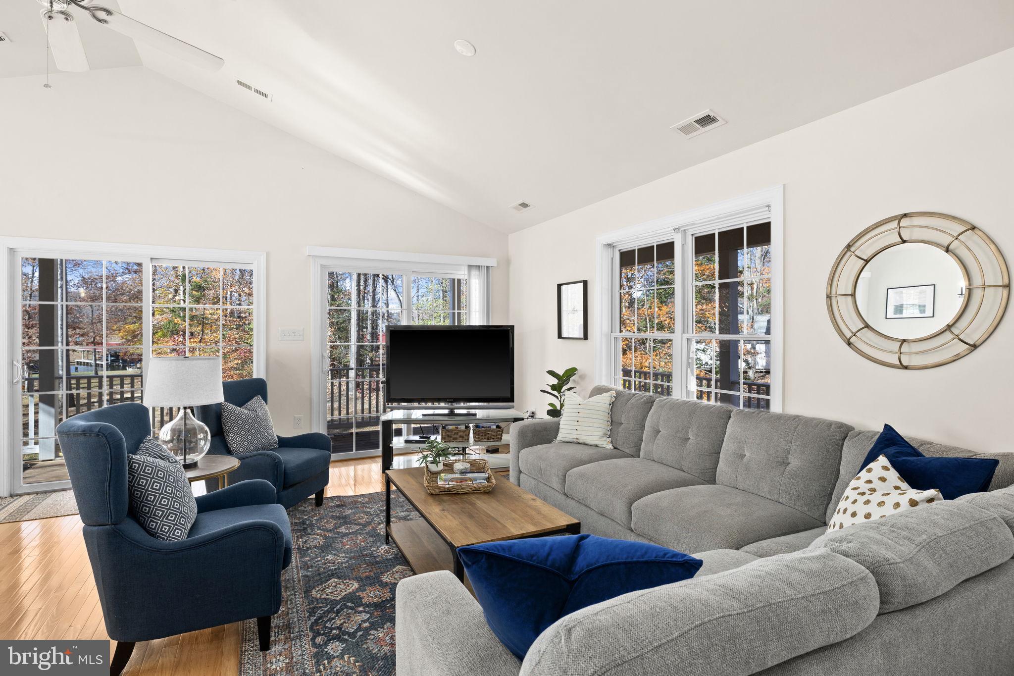 14 Oak Road Bumpass, VA 23024 - Photo 22 of 75 a living room with furniture a rug and a flat screen tv