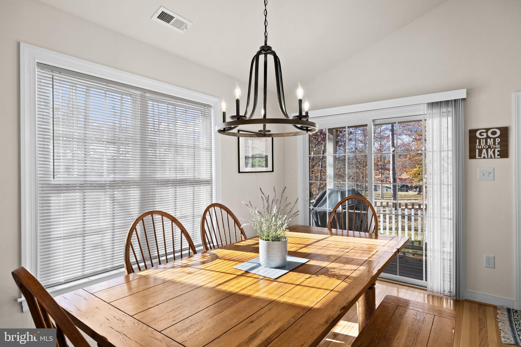 14 Oak Road Bumpass, VA 23024 - Photo 26 of 75 a view of a dining room with furniture window and wooden floor