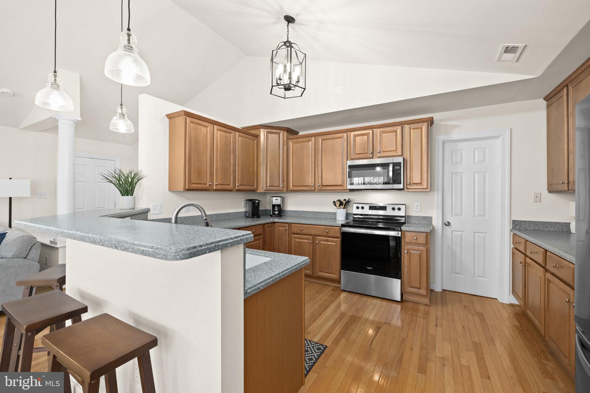 14 Oak Road Bumpass, VA 23024 - Photo 29 of 75 a kitchen with stainless steel appliances granite countertop a sink stove and refrigerator