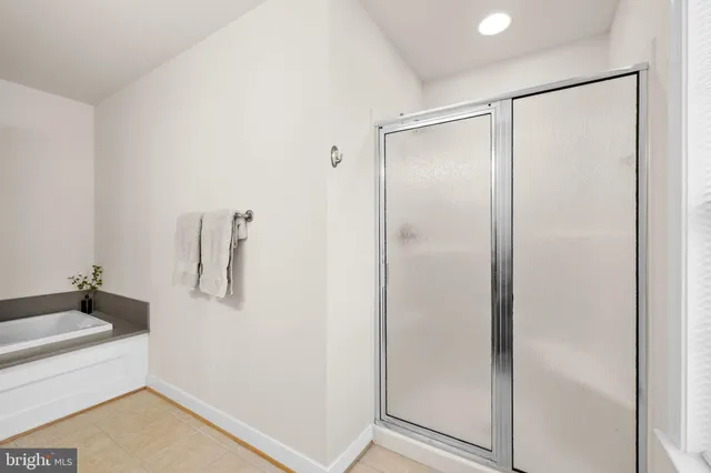 a room with furniture and air hockey table