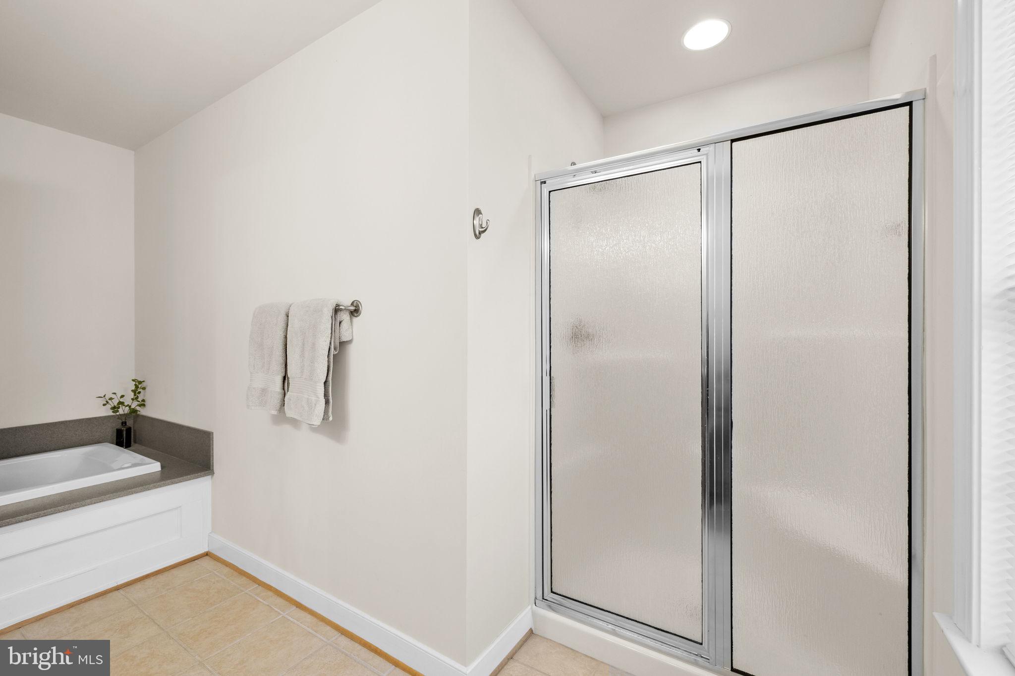 14 Oak Road Bumpass, VA 23024 - Photo 38 of 75 a bathroom with a shower and a sink