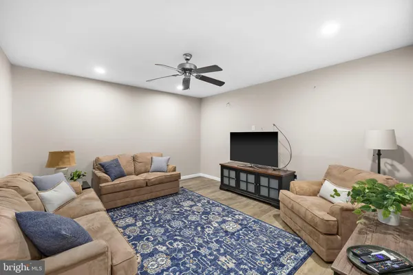 a swimming pool with some trees in the background