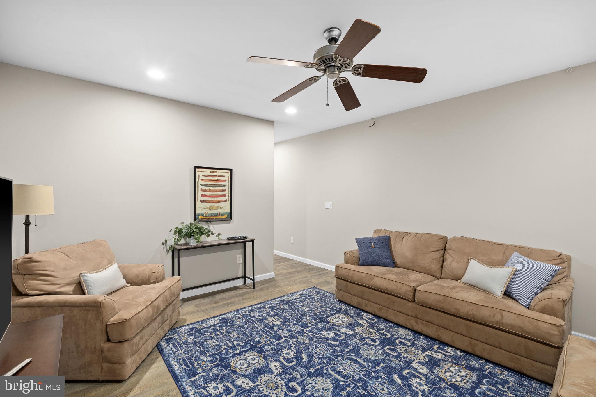 14 Oak Road Bumpass, VA 23024 - Photo 45 of 75 a living room with furniture and a rug