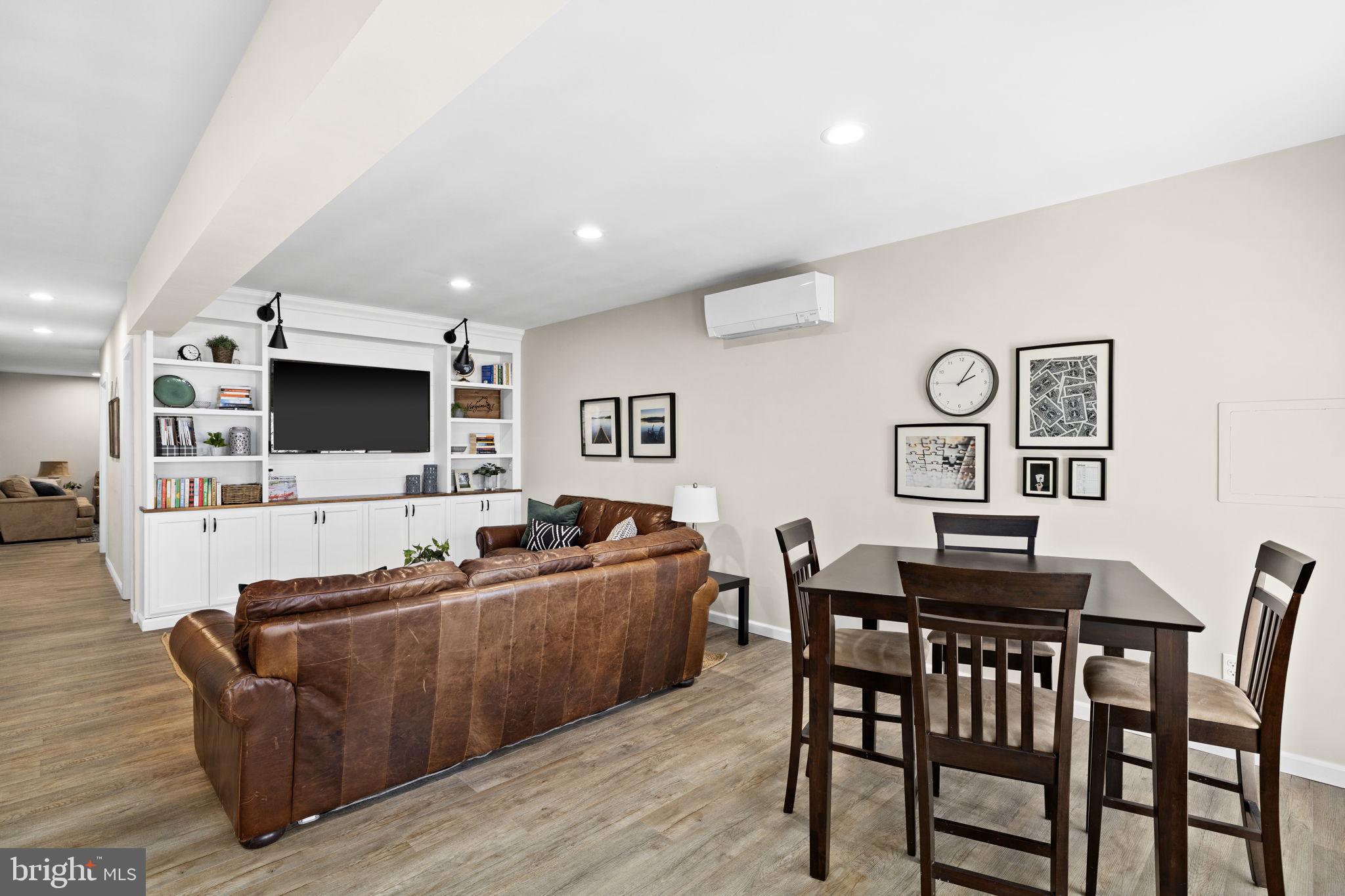 14 Oak Road Bumpass, VA 23024 - Photo 48 of 75 a living room with furniture and a flat screen tv