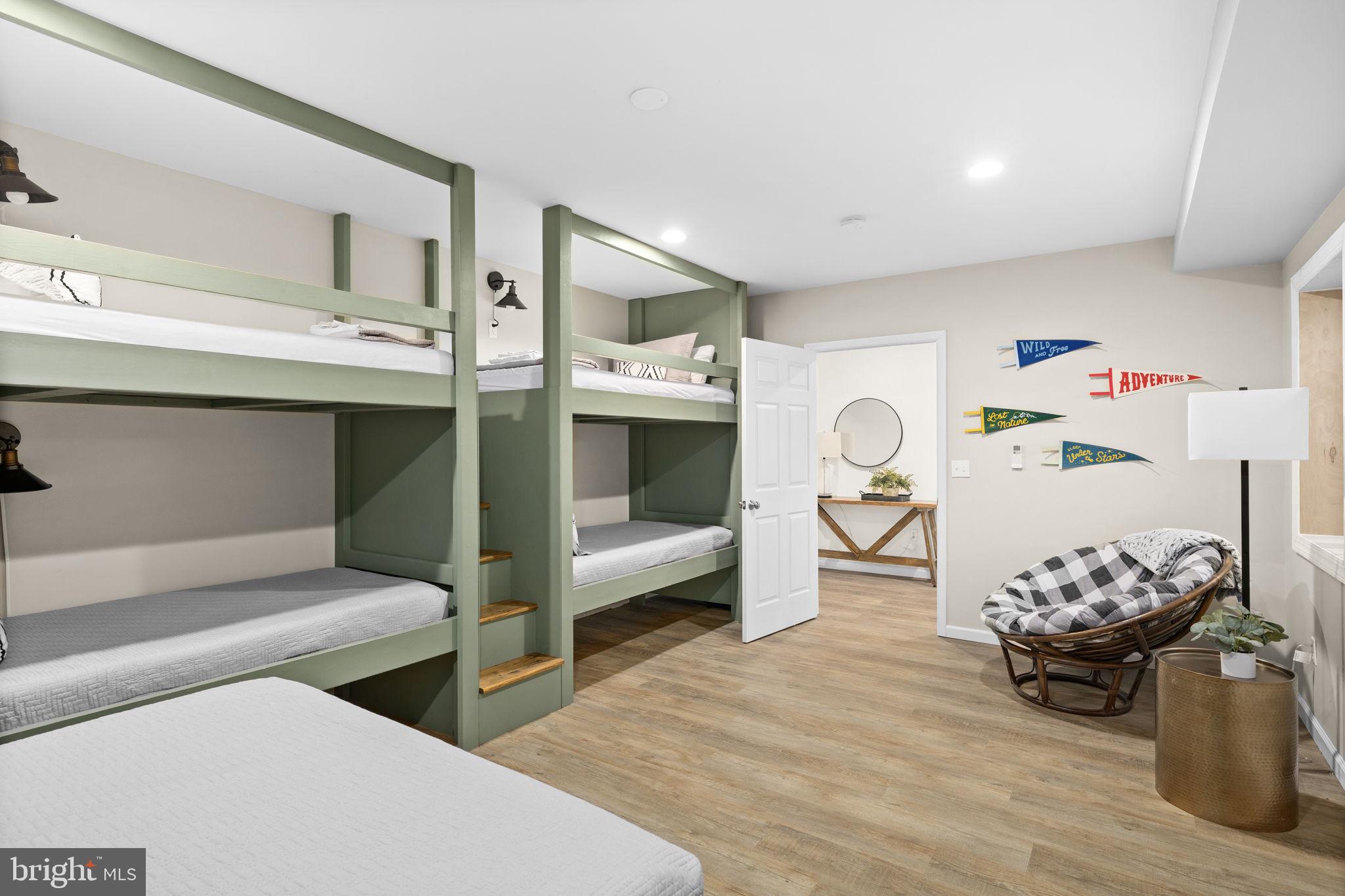 14 Oak Road Bumpass, VA 23024 - Photo 53 of 75 a bedroom with furniture and a fireplace