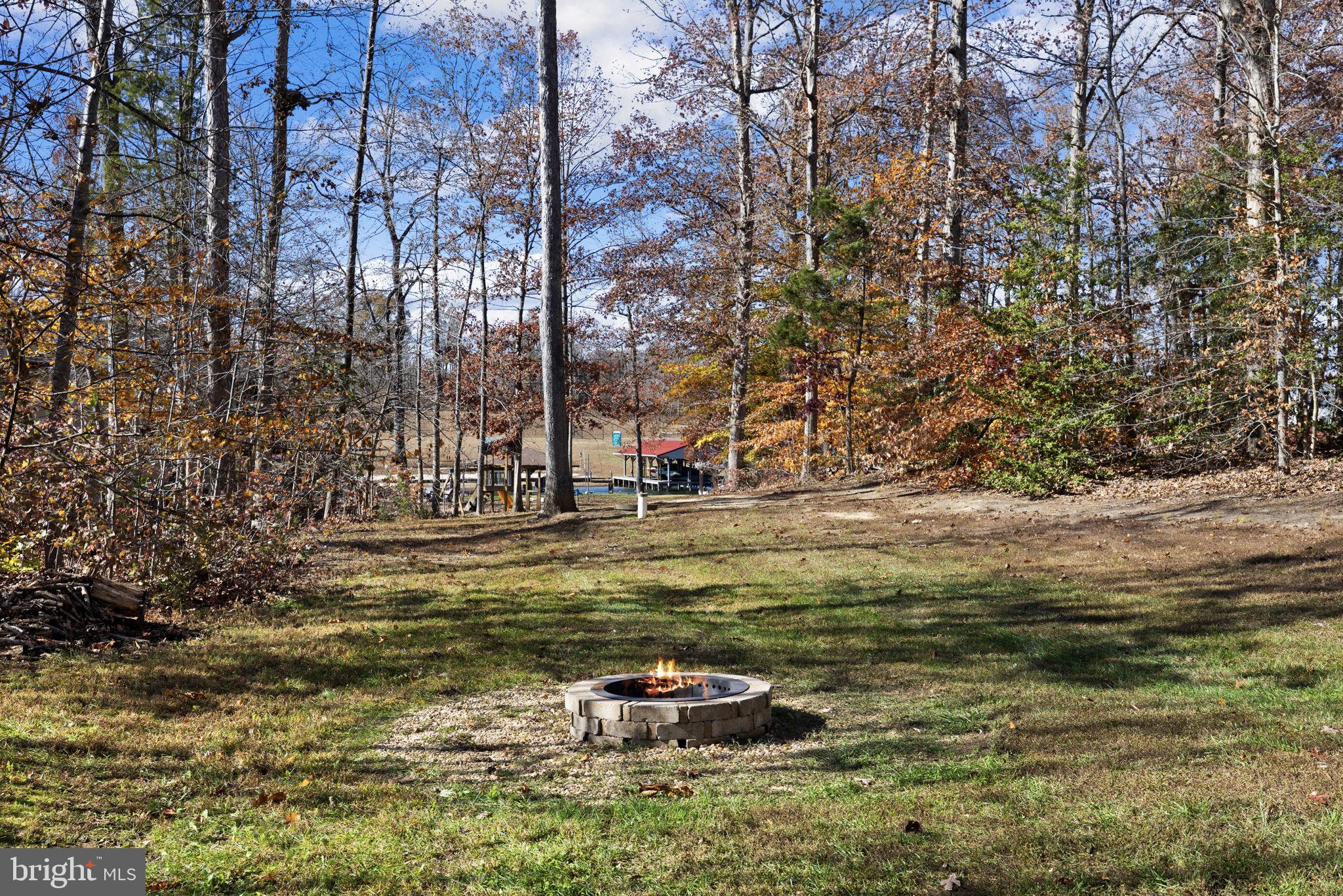 14 Oak Road Bumpass, VA 23024 - Photo 61 of 75 a swimming pool with some trees in the background