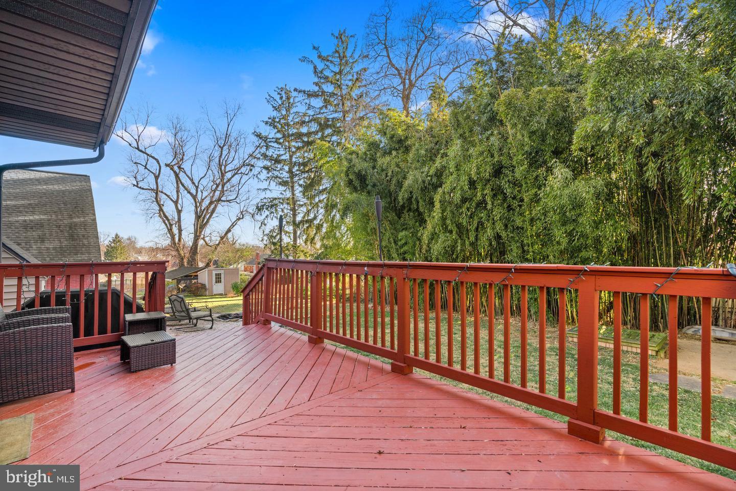 12908 Estelle Road Silver Spring, MD 20906 - Photo 13 of 19 a view of deck with wooden floor and outdoor seating