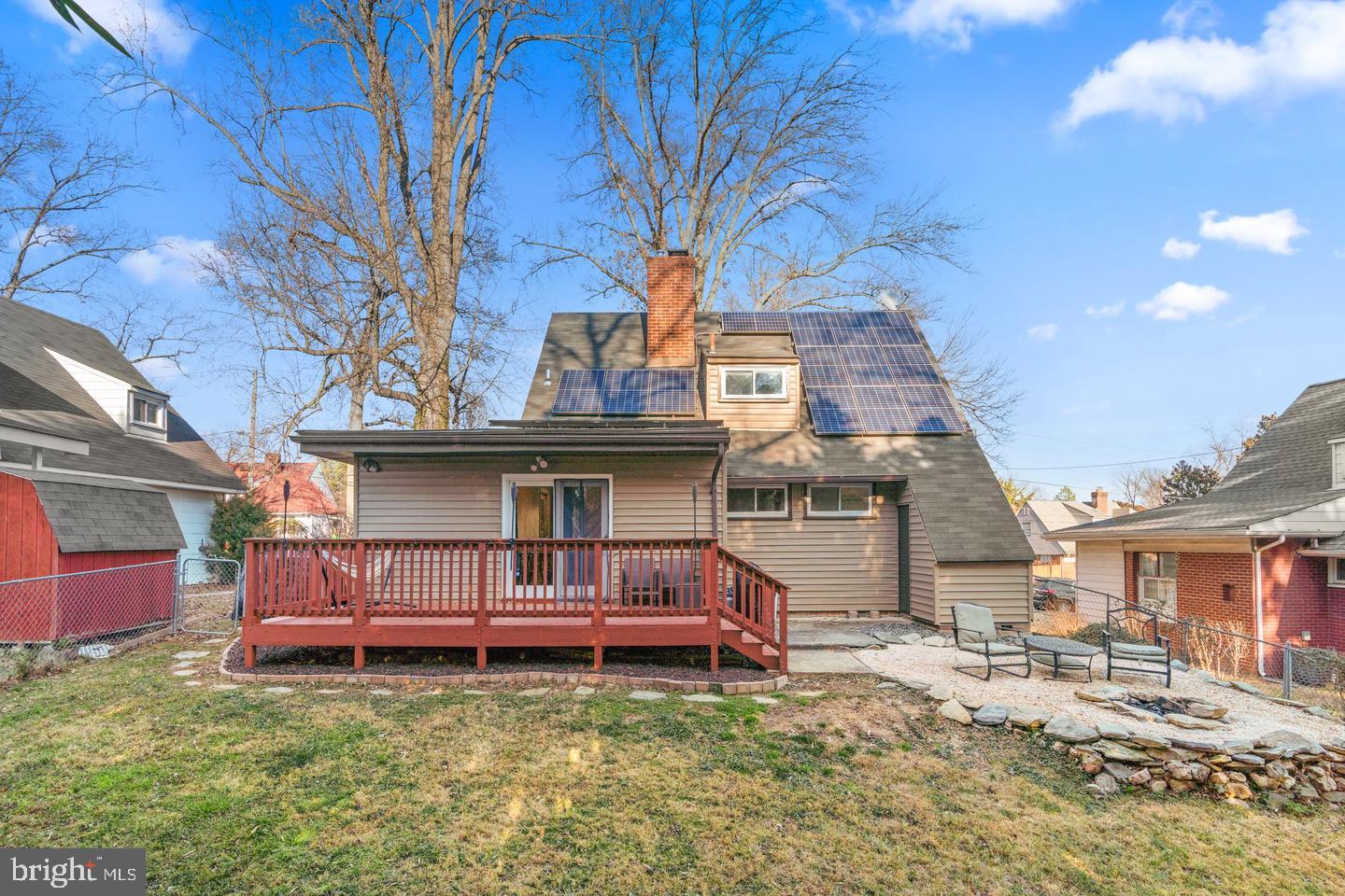12908 Estelle Road Silver Spring, MD 20906 - Photo 15 of 19 a view of a house with a back yard