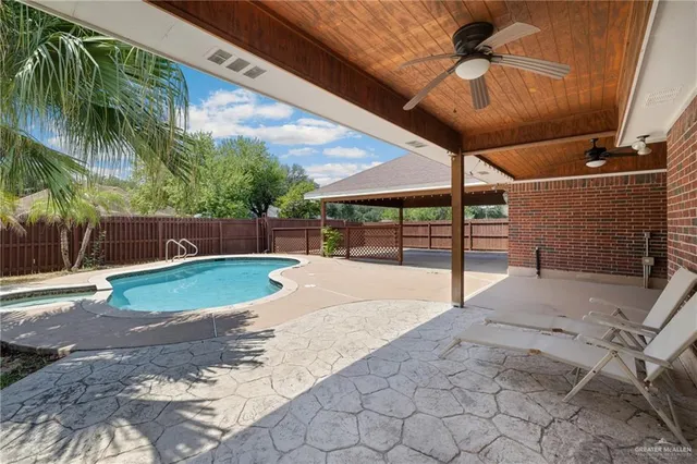 a view of outdoor space and backyard