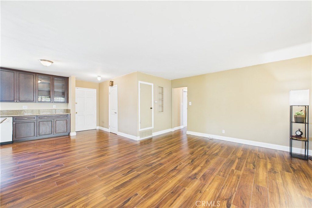 10002 St Elizabeth Circle Cypress, CA 90630 - Photo 11 of 35 a view of a kitchen with wooden floor