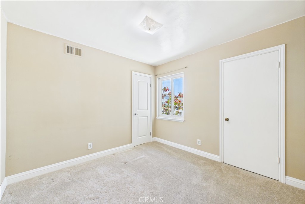 10002 St Elizabeth Circle Cypress, CA 90630 - Photo 18 of 35 a view of an empty room