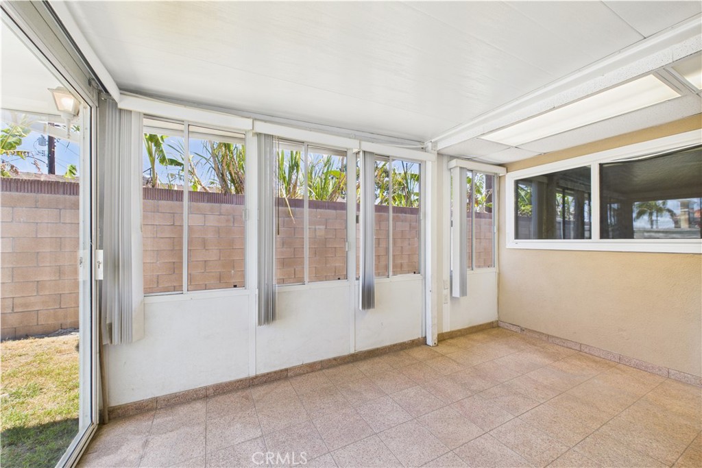 10002 St Elizabeth Circle Cypress, CA 90630 - Photo 27 of 35 a view of an empty room with a window