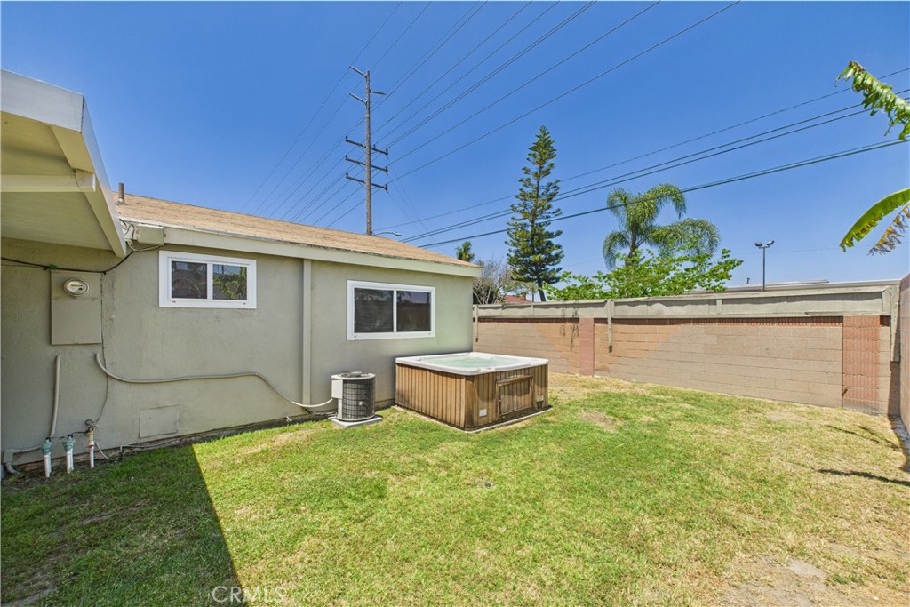 10002 St Elizabeth Circle Cypress, CA 90630 - Photo 29 of 35 a front view of a house with garden