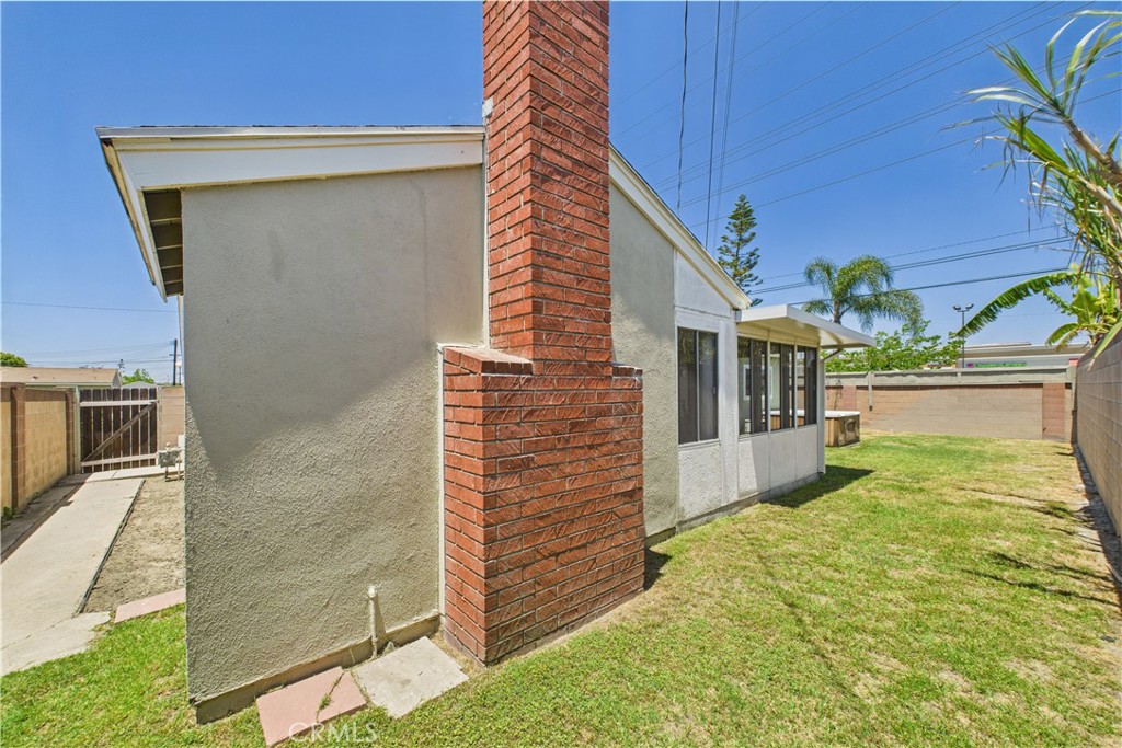 10002 St Elizabeth Circle Cypress, CA 90630 - Photo 31 of 35 a bathroom with a sink and mirror