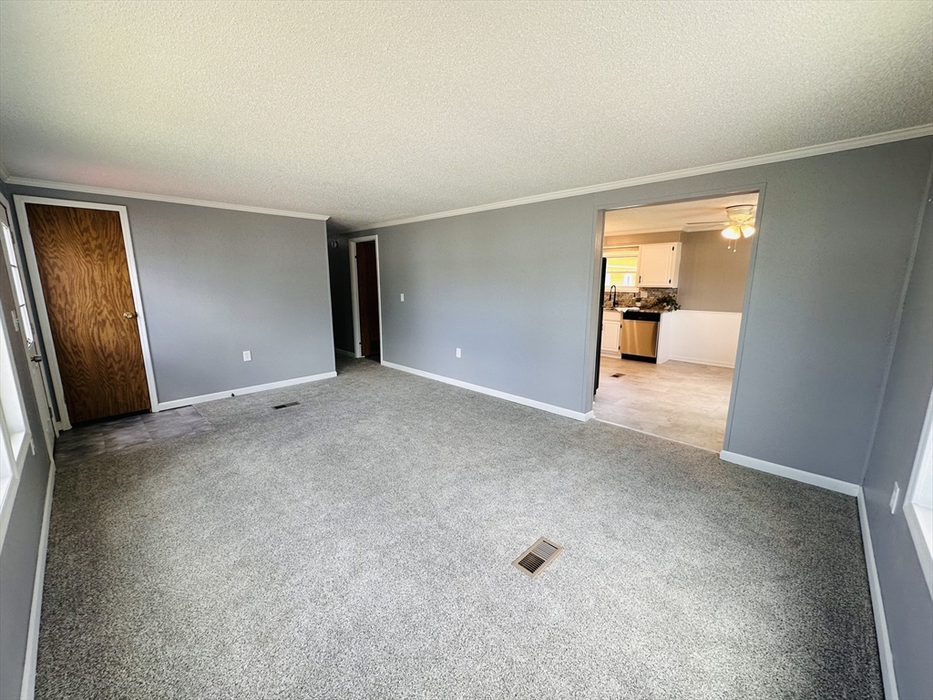 93 Grochmal Avenue, Unit 119 Springfield, MA 01151 - Photo 16 of 33 an empty room with closet and a bathroom