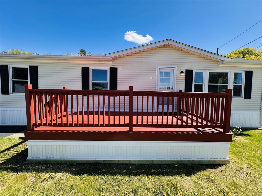 93 Grochmal Avenue, Unit 119 Springfield, MA 01151 - Photo 3 of 33 a view of a house with a wooden deck