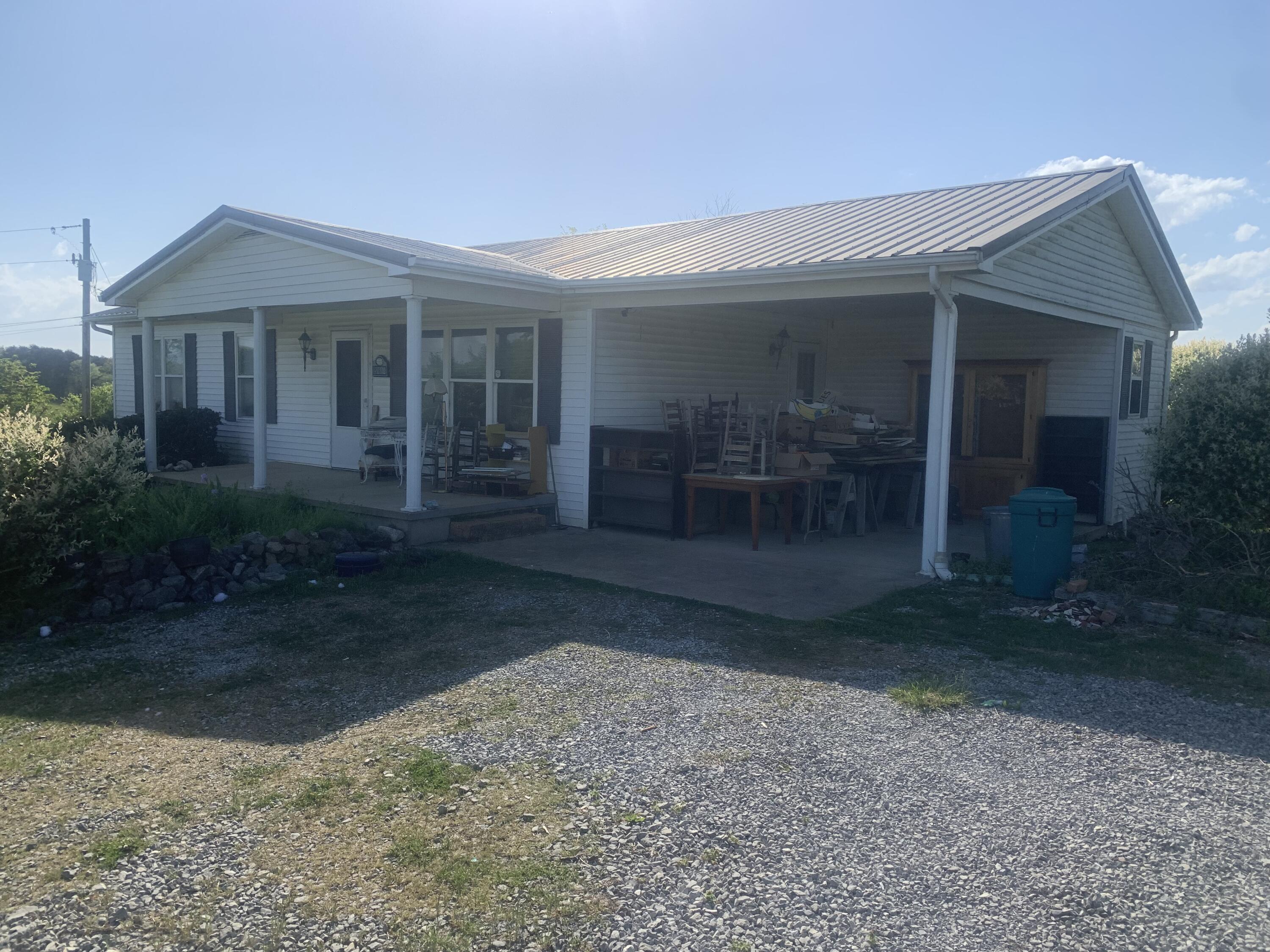 2761 Bright Hope Road Mosheim, TN 37818 - Photo 2 of 10 Floyd carport