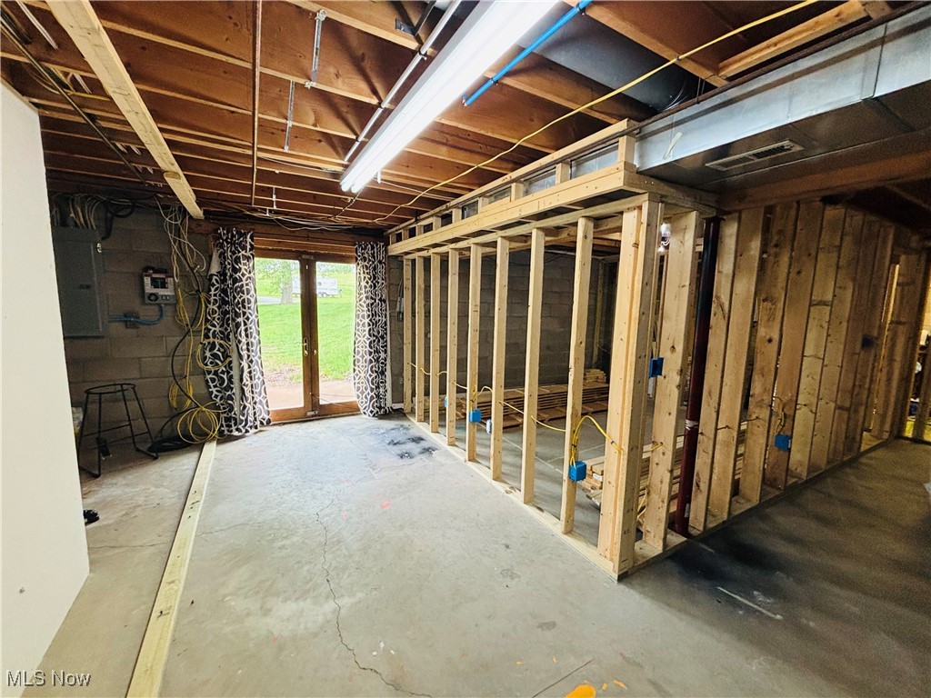 240 Anderson Road Fleming, OH 45729 - Photo 16 of 28 Basement walk-out with framing in place for additional bedrooms.
