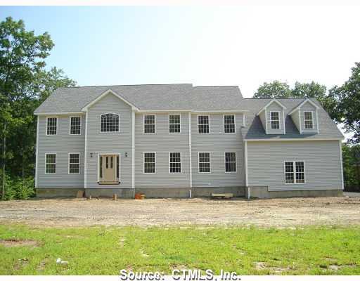 5 Addison Court Wolcott, CT 06716 - Photo 1 of 1 Exterior Front. Exterior Front before completion. Walk way to be installed, Front door dressings, Wide Staircase and Grass. Level Private acre on 7 home cul-de-sac.