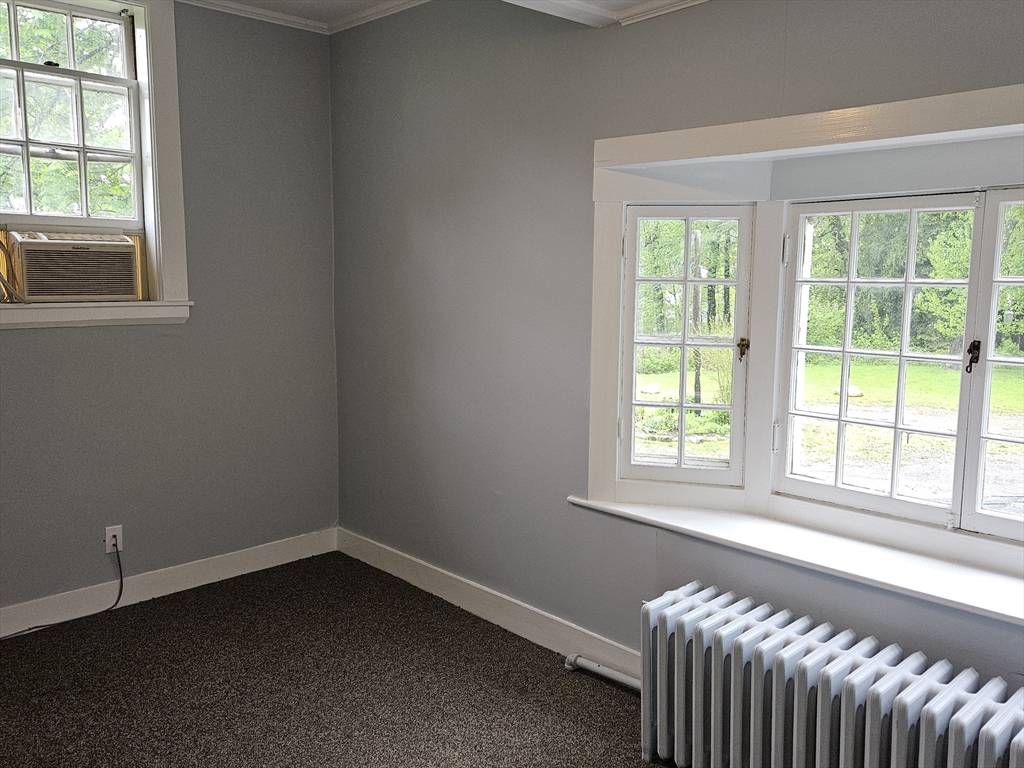 960 Boston Post Road East Marlborough, MA 01752 - Photo 6 of 12 an empty room with a window