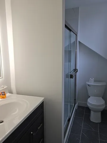 a bathroom with a toilet