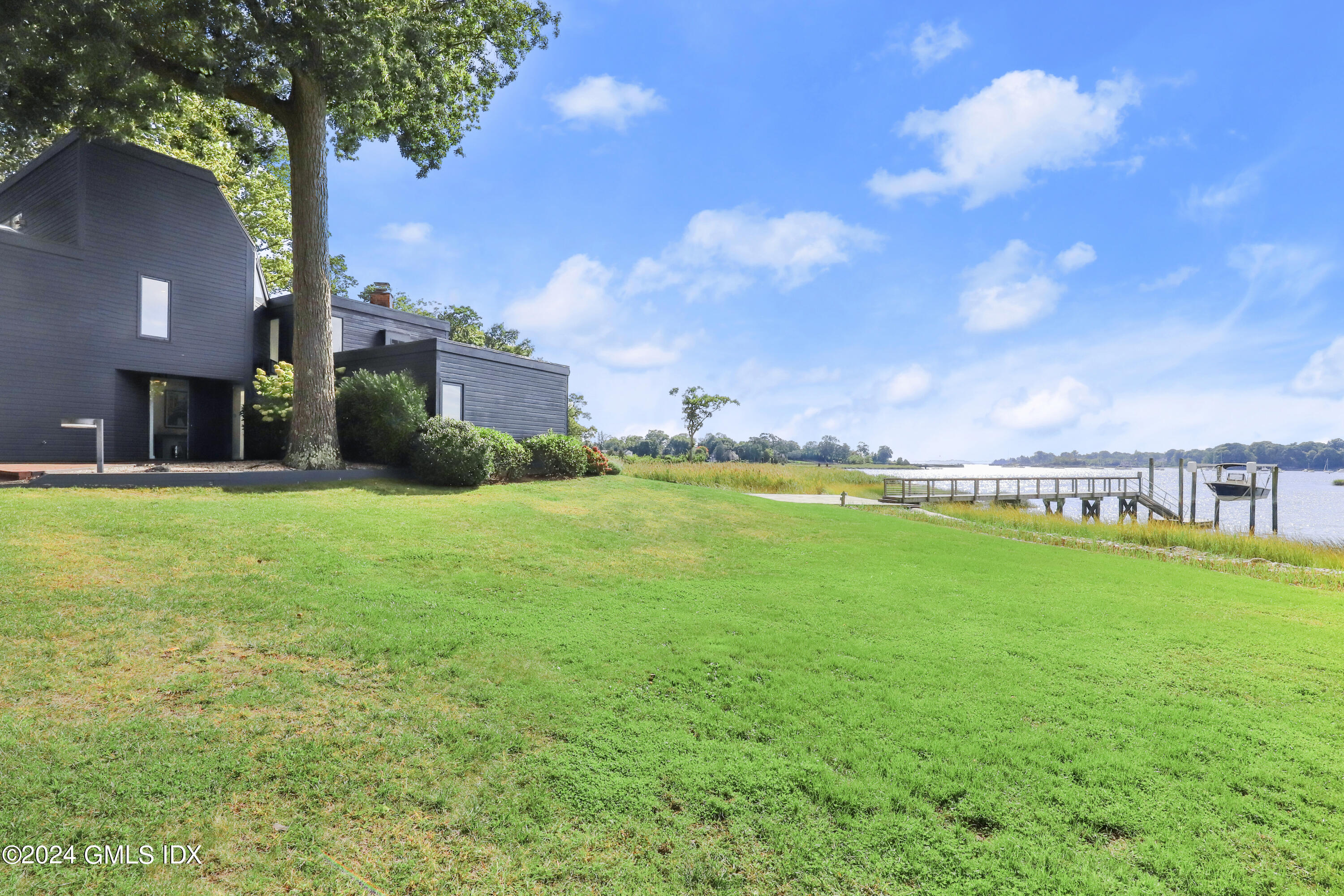 a view of a big yard with a fountain and a big yard