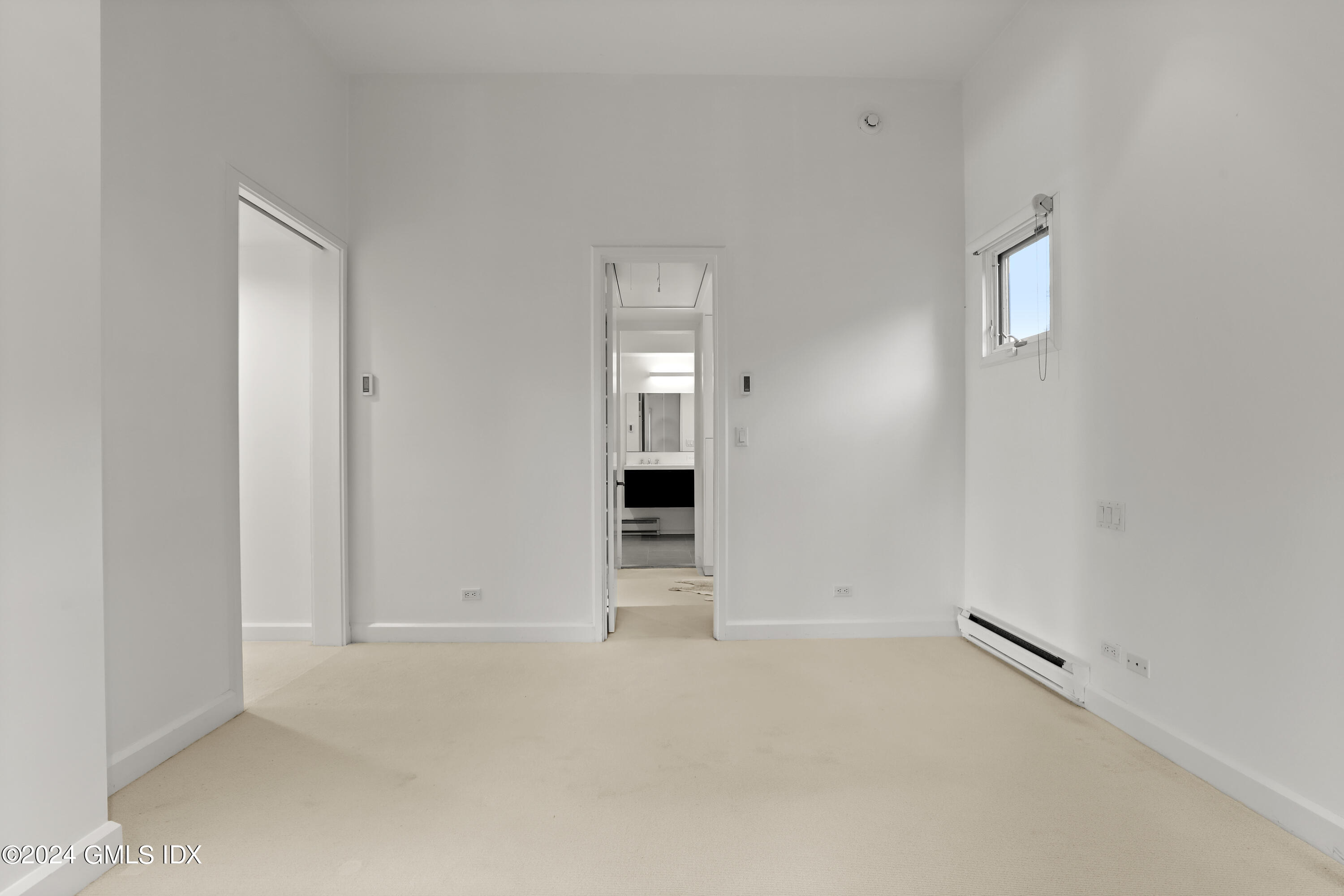 46 Carriglea Drive Riverside, CT 06878 - Photo 26 of 48 an empty room with windows and closet