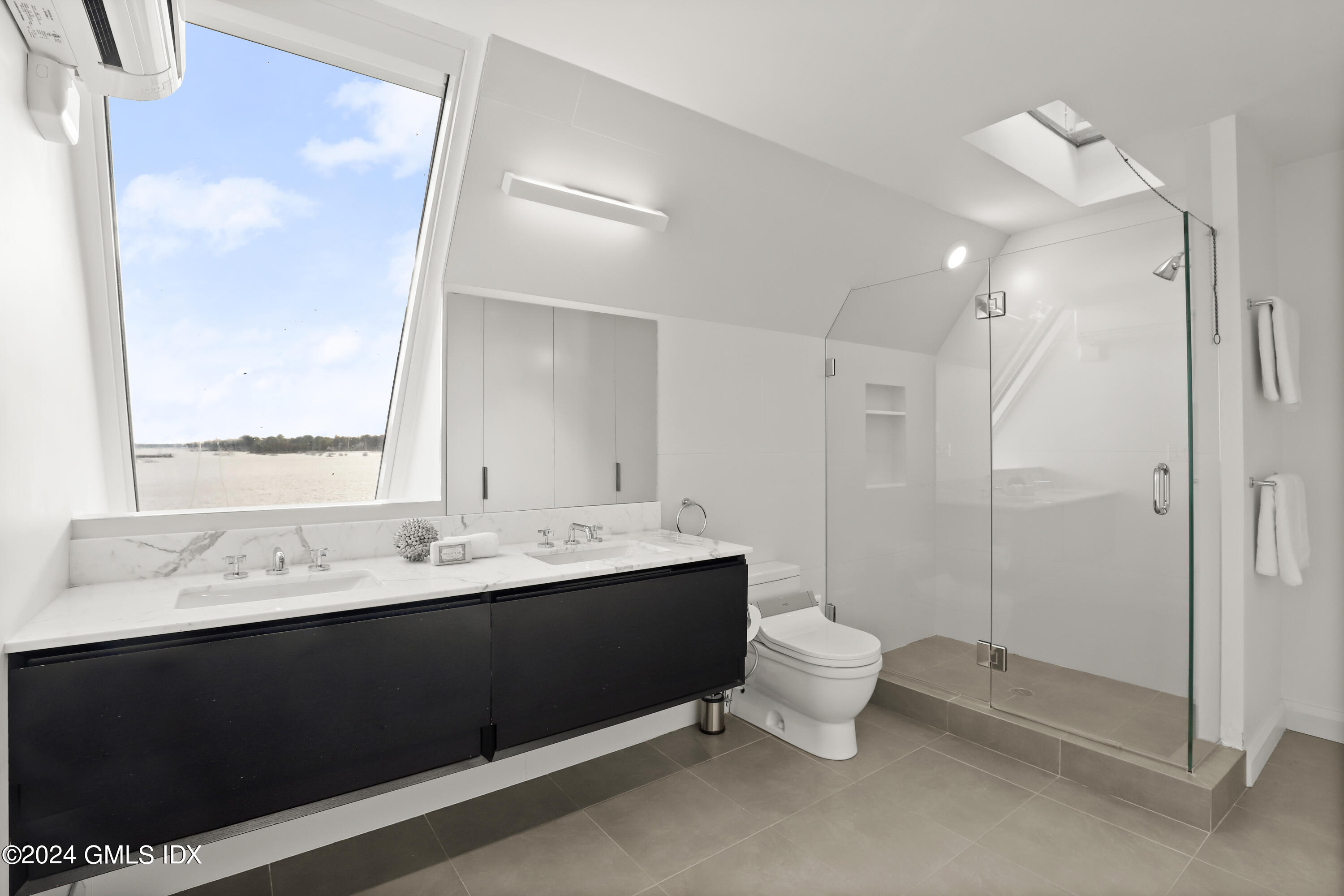 46 Carriglea Drive Riverside, CT 06878 - Photo 39 of 48 a bathroom with a double vanity sink mirror and toilet