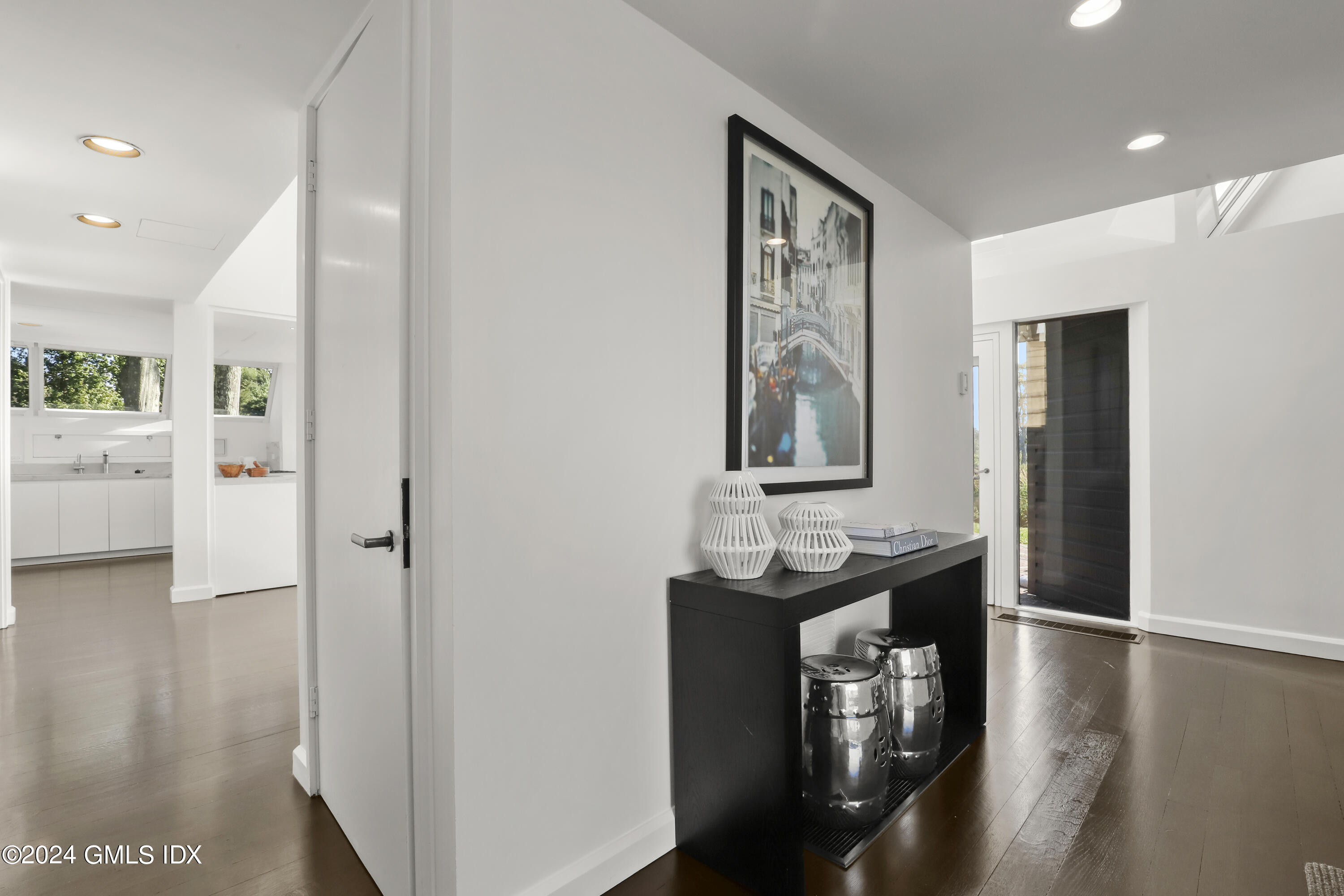 46 Carriglea Drive Riverside, CT 06878 - Photo 5 of 48 a view of a hallway to a livingroom with furniture