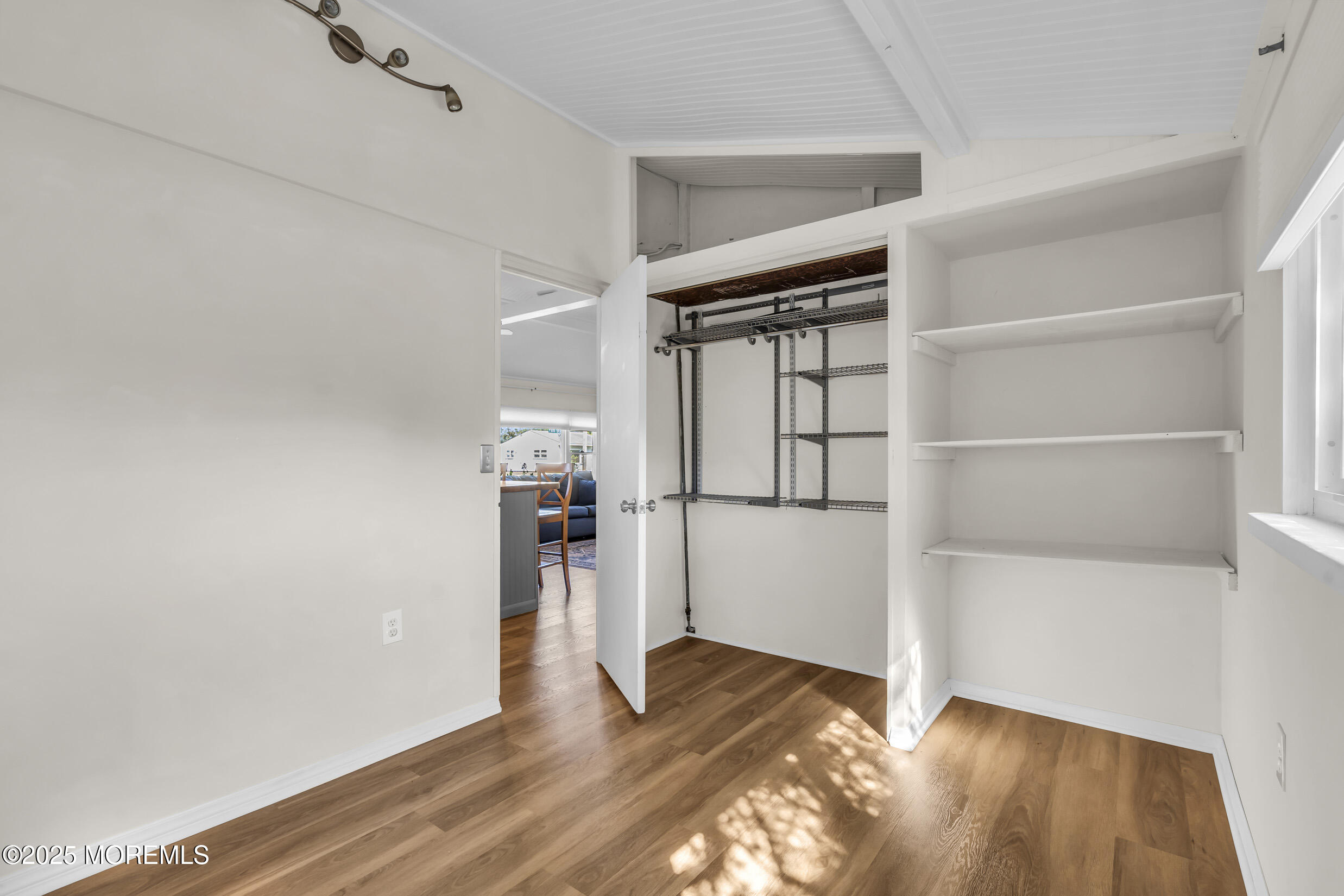 419 Beach Boulevard Forked River, NJ 08731 - Photo 16 of 21 a view of empty room with wooden floor