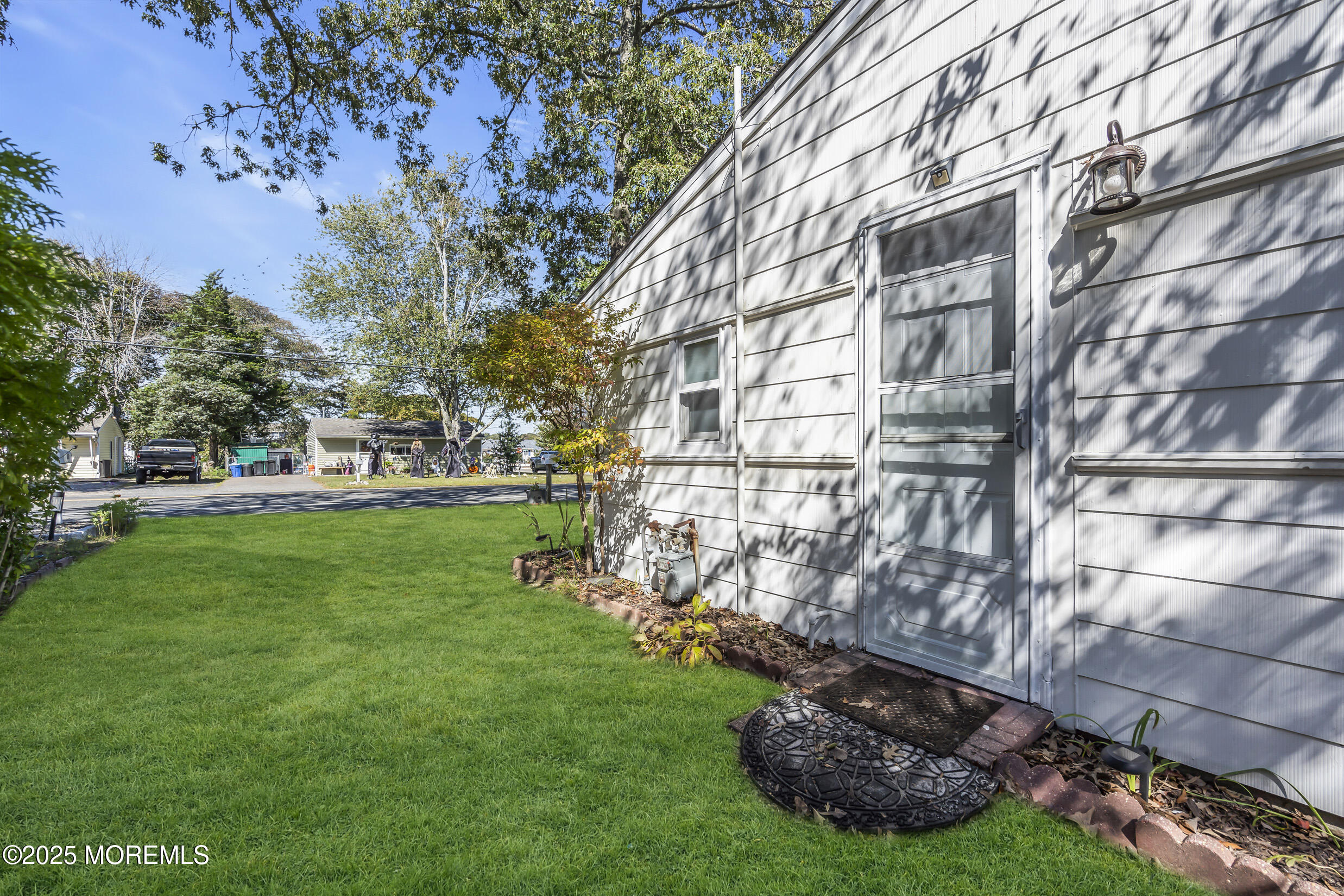 419 Beach Boulevard Forked River, NJ 08731 - Photo 21 of 21 a view of a building with a yard