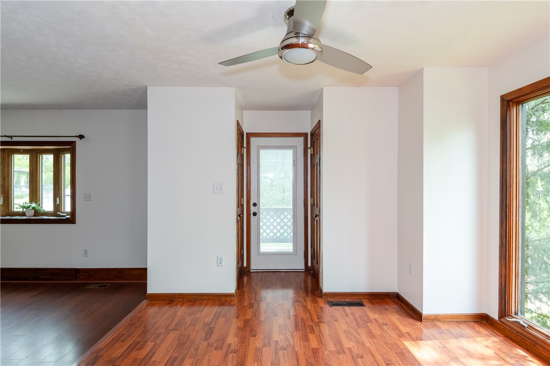 6750 Little Twin Road Germantown, OH 45327 - Photo 10 of 88 Bright interior features warm wood flooring and ample natural light, creating an inviting atmosphere.