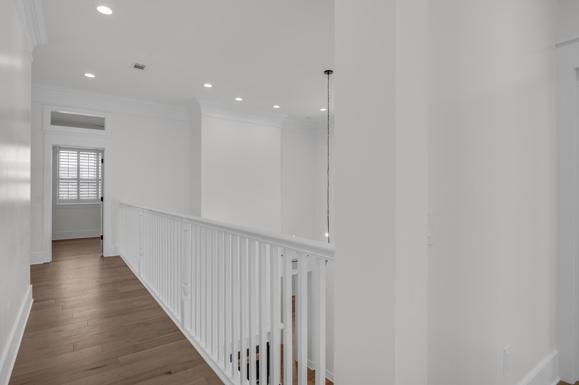 488 Regatta Bay Boulevard Destin, FL 32541 - Photo 36 of 46 a view of a hallway with wooden floor