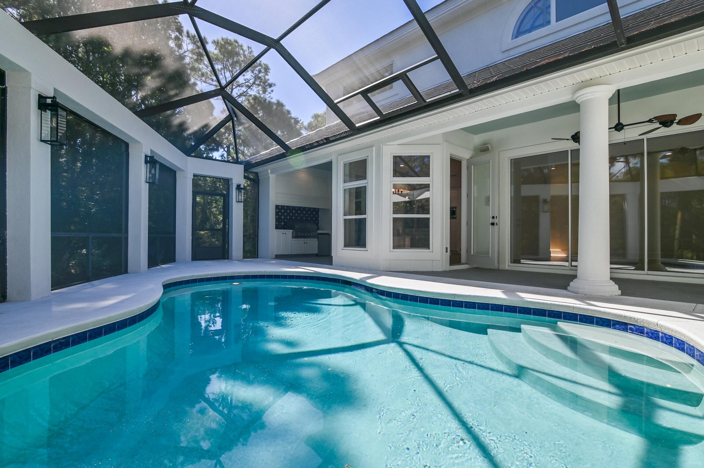 488 Regatta Bay Boulevard Destin, FL 32541 - Photo 39 of 46 a swimming pool with patio outdoor seating and yard