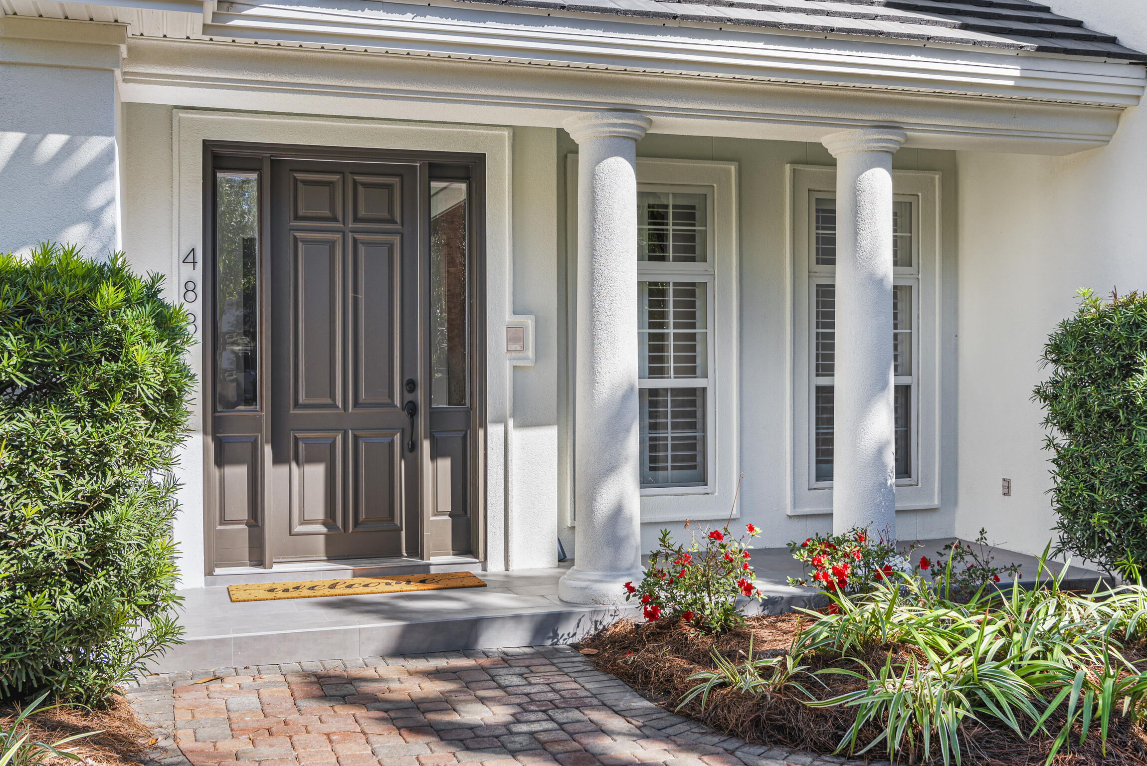 488 Regatta Bay Boulevard Destin, FL 32541 - Photo 4 of 46 front view of a house with potted plants