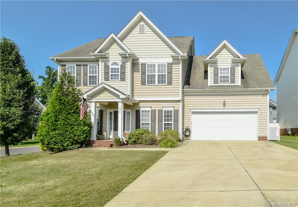 225 Mott Road Mooresville, NC 28115 - Photo 2 of 24 a front view of a house with garden