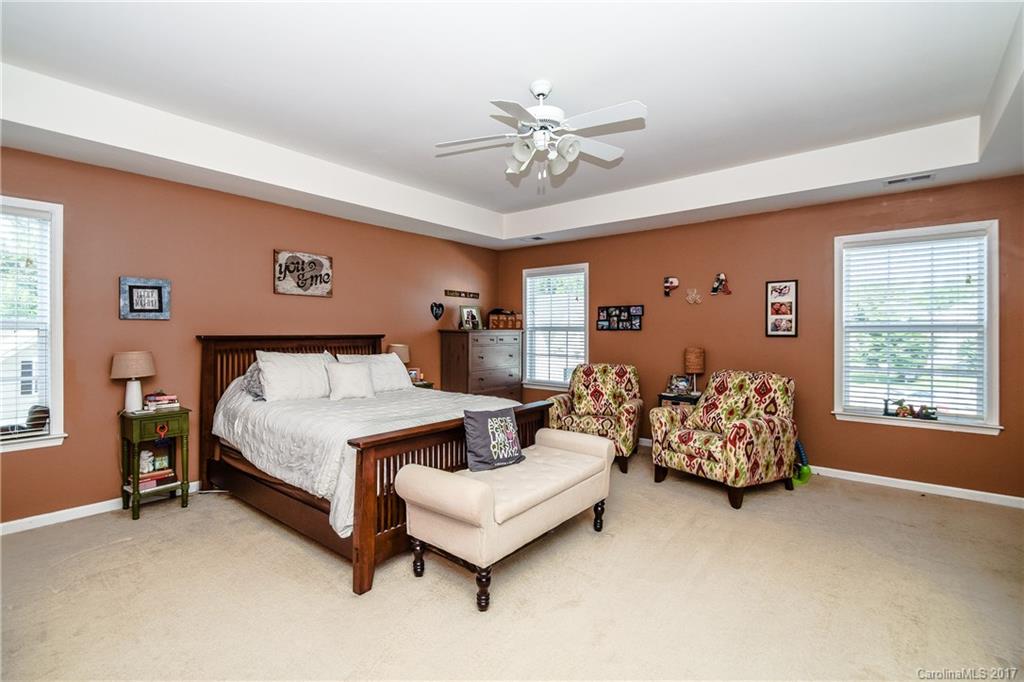 225 Mott Road Mooresville, NC 28115 - Photo 19 of 24 a bedroom with bed and window
