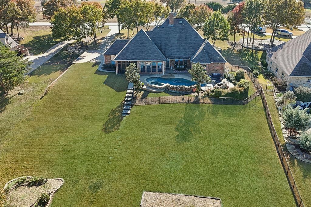3611 Skinner Road Midlothian, TX 76065 - Photo 1 of 40 a aerial view of a house with swimming pool garden and patio