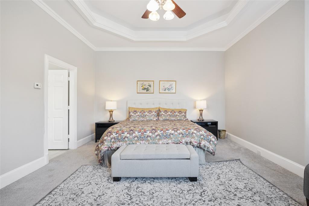 3611 Skinner Road Midlothian, TX 76065 - Photo 16 of 40 a bedroom with a bed and a couch