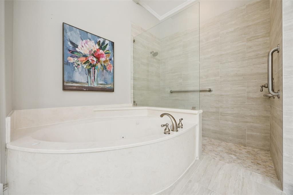 3611 Skinner Road Midlothian, TX 76065 - Photo 17 of 40 a white bath tub sitting next to a white wall