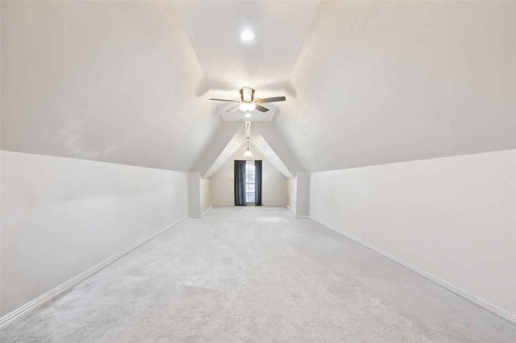 3611 Skinner Road Midlothian, TX 76065 - Photo 24 of 40 a view of a room with a ceiling fan